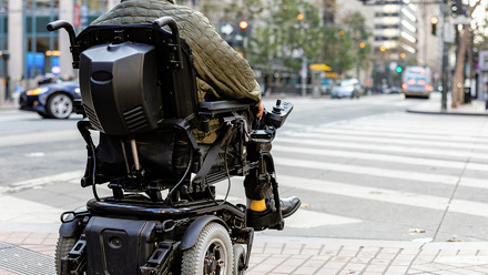 06-Pedestrian-in-electric-wheel-chair_1622087701.jpg