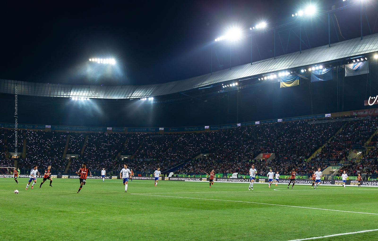  MAY 22, 2019 - KHARKIV, UKRAINE: Metalist Stadium beautiful picturesque panoramic view with fog and lights on the stands during the match. Shakhtar Donetsk  – Dynamo Kyiv.